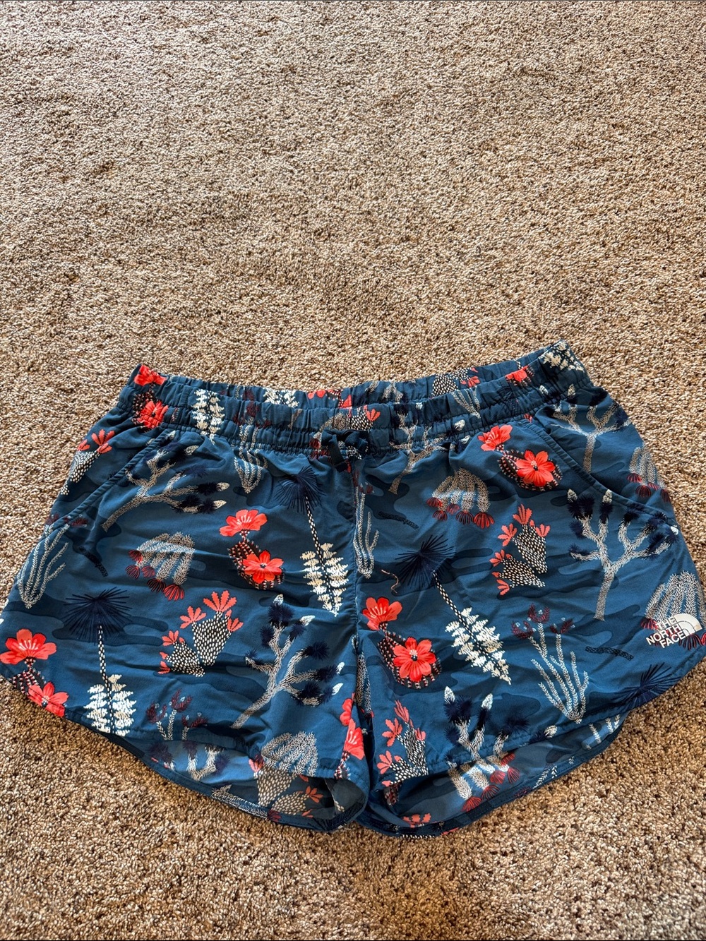 The North Face Women's Navy Floral Athletic Shorts with Red Accents